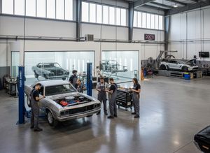 Busy Auto Repair Shop with Classic Car Restoration