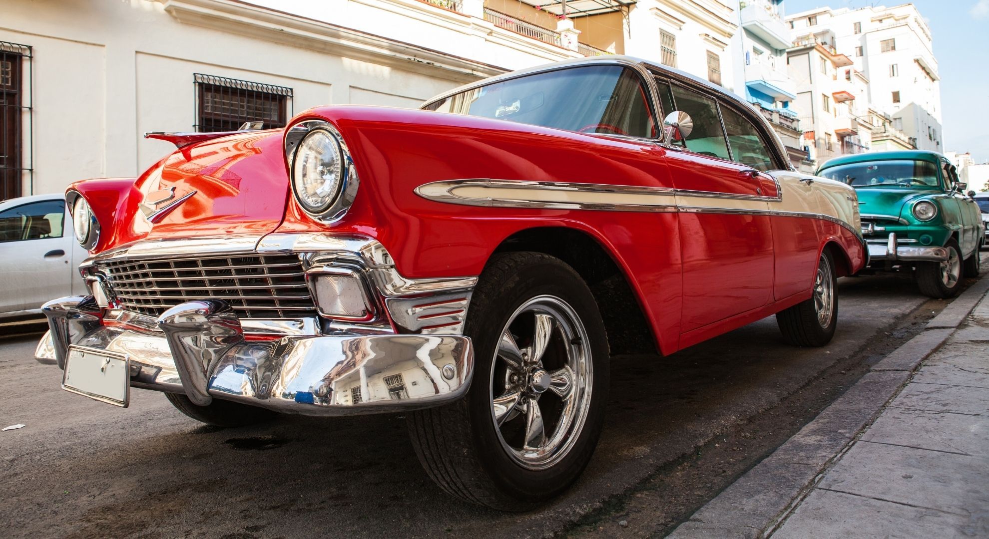 low angle of classic red car low angle of classic red car