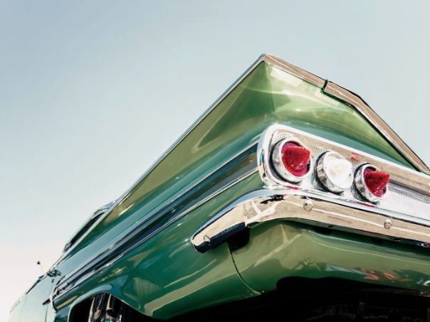 Close-up of a classic green car Common Mistakes to Avoid When Restoring a Classic Car Hero.jpg